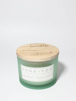 Eucalyptus 12 oz scented candle Sea Foam vessel with breathe relax unwind lid